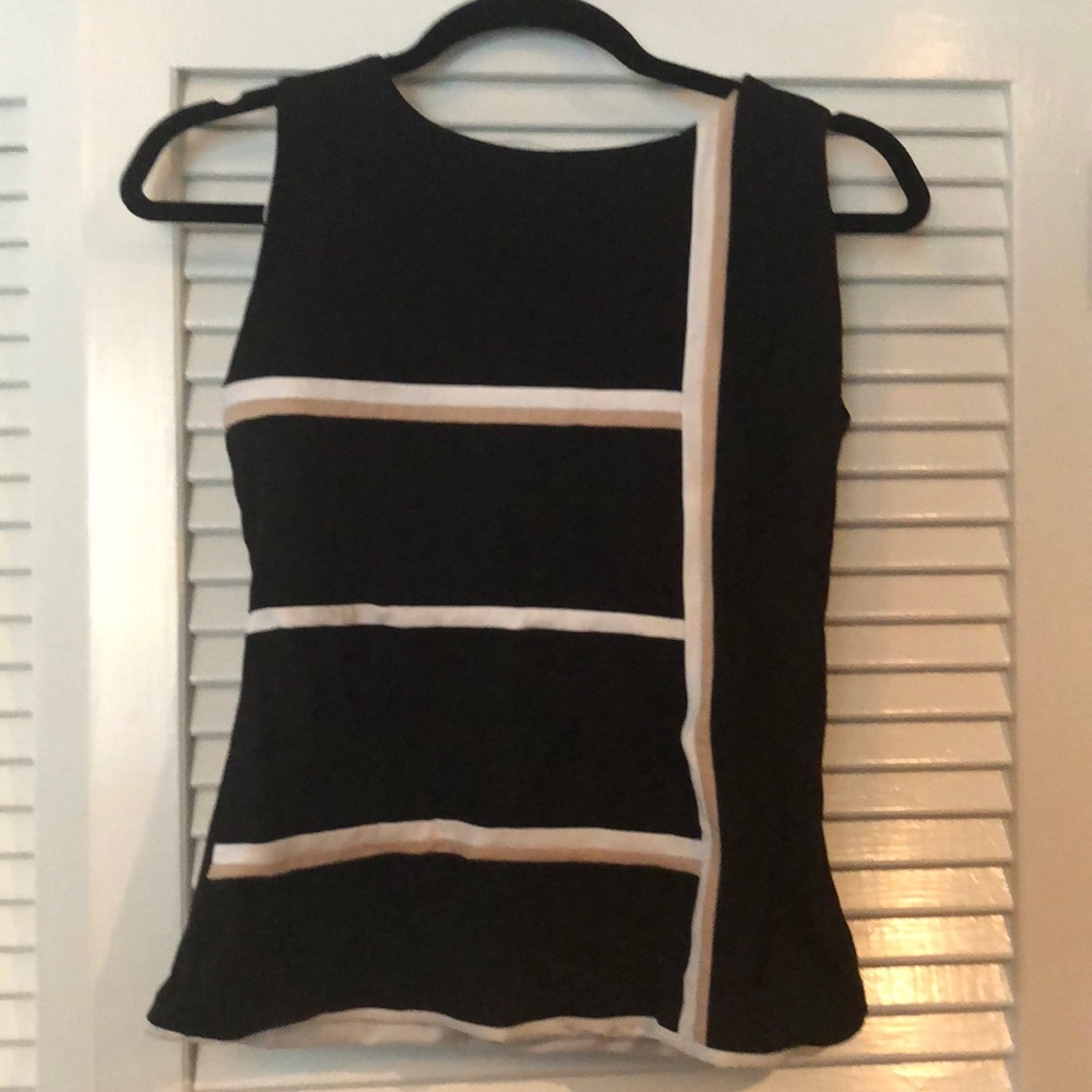 White House Black Market black sleeveless top.